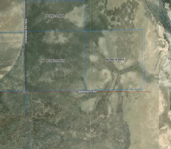 Aerial Property Map. Illustrating the boundaries of the property and adjacent parcels with identifying numbers