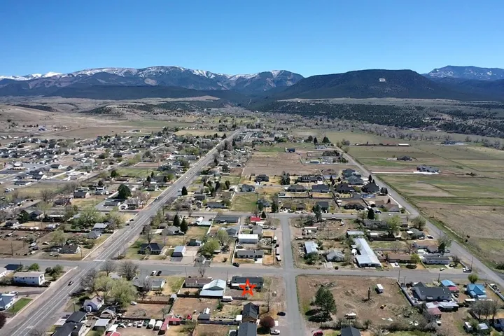 Aerial view of residential area with mountains