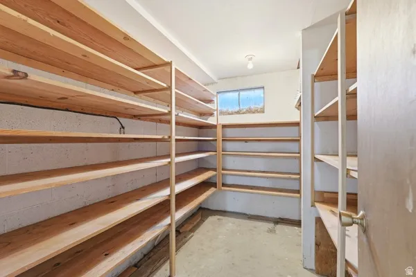 Extensive wood shelving units providing abundant storage space