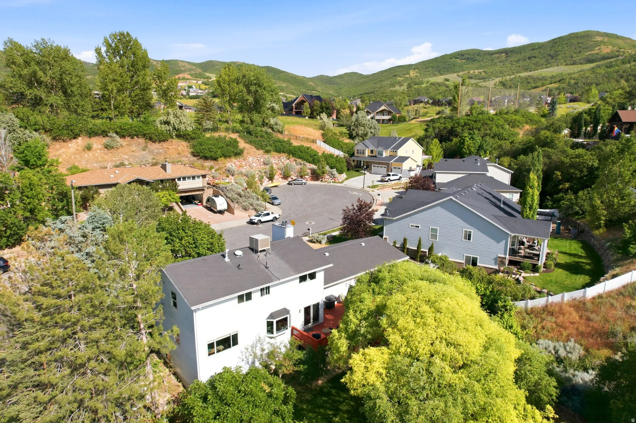 Aerial perspective showcasing a residential area with varied home designs