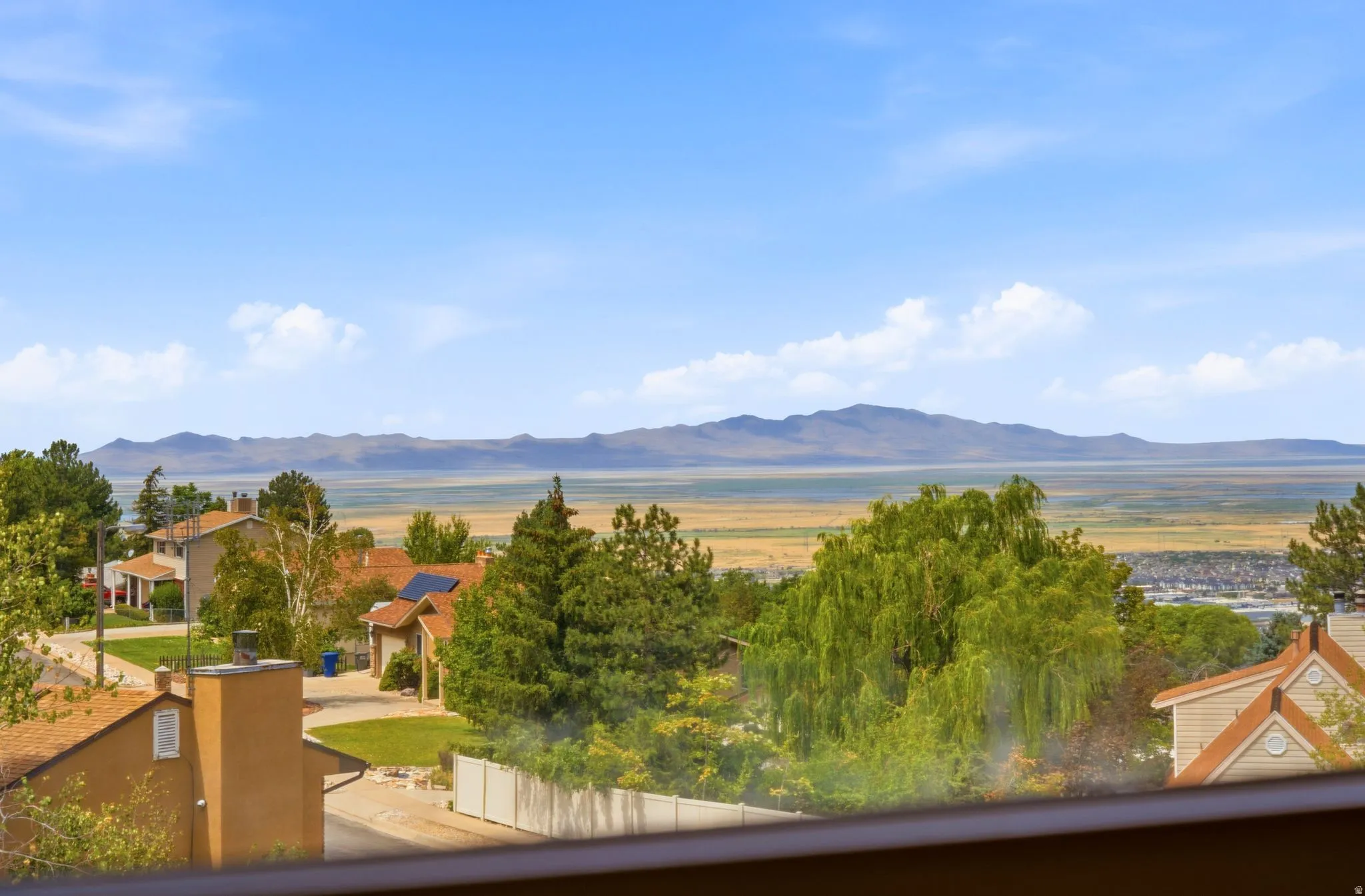 Expansive mountain range backdrop and distant landscape