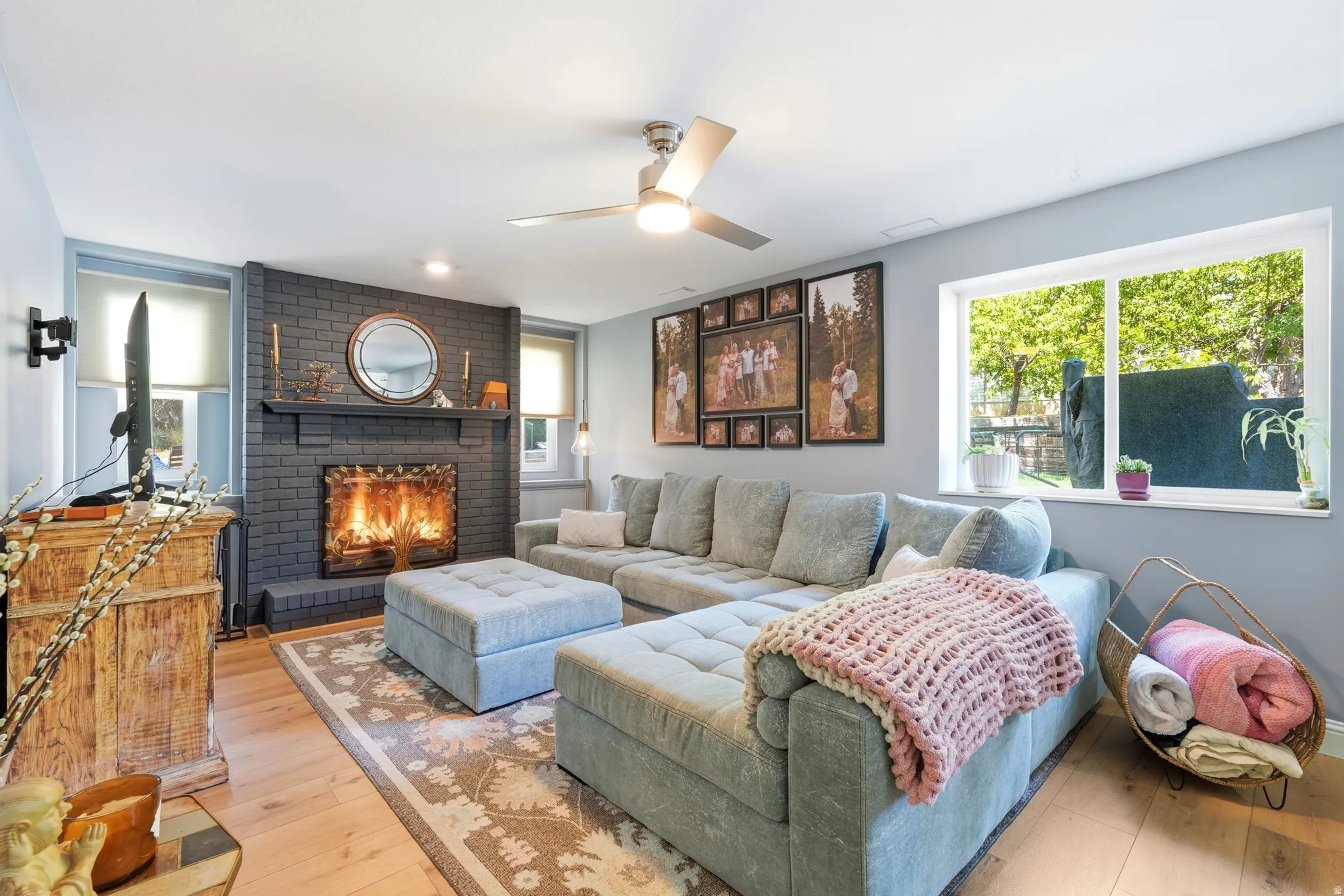 Living area featuring LVP flooring and light blue wall tones