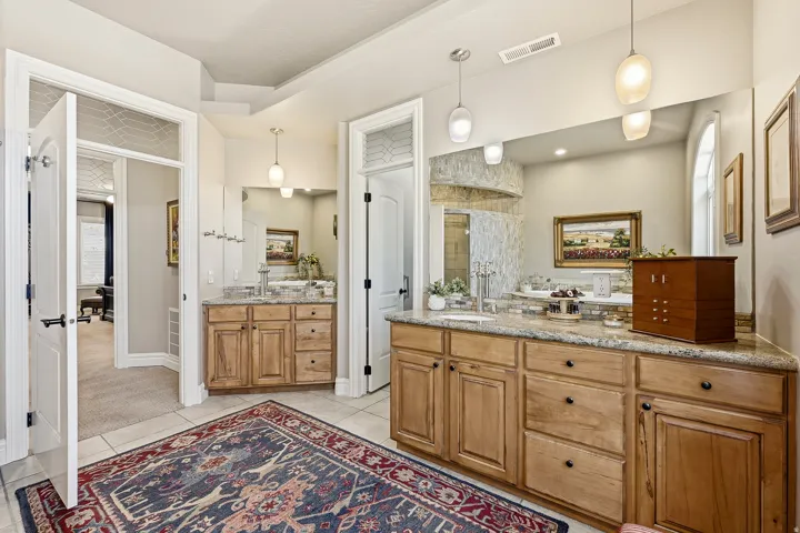 Spa-Inspired Primary Bath with Soaking Tub, Walk-In Shower, Dual Vanities, Walk-in Closet and Private Sauna