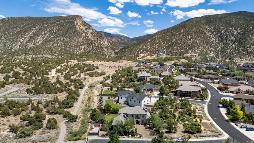 Aerial View of Ashdown Forest Framed by Mountainous Terrain Highlighting the Home's Exceptional Setting, Open Space and Fiddlers Canyon Mountain Views