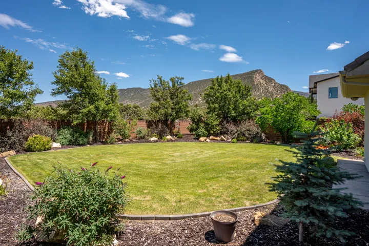 Professionally Landscaped Grounds with Panoramic Mountain Views and Established Landscaping with Room to Customize