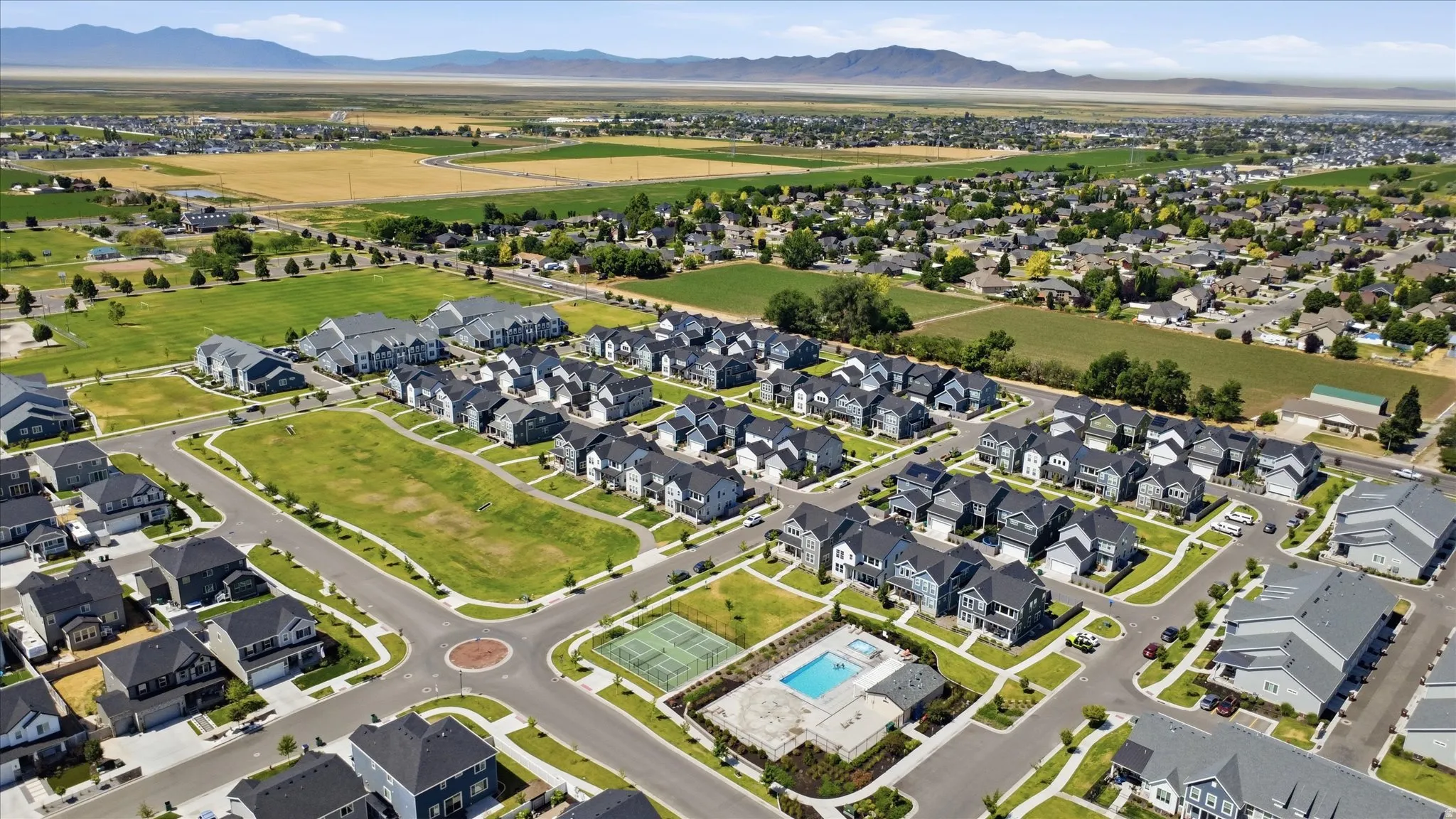 Aerial perspective showcasing a residential community with a variety of home styles
