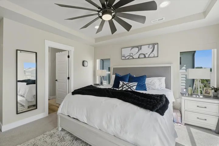 Recessed ceiling with an overhead fan featuring integrated lighting