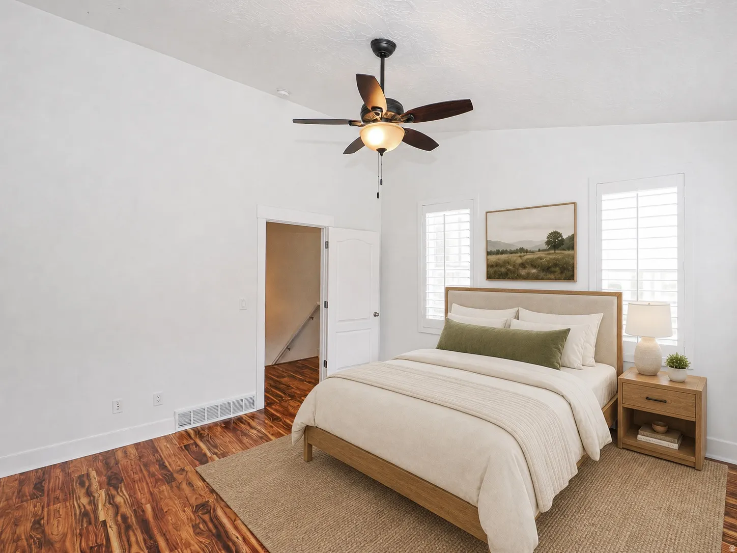 Vaulted ceiling with a ceiling fan light fixture