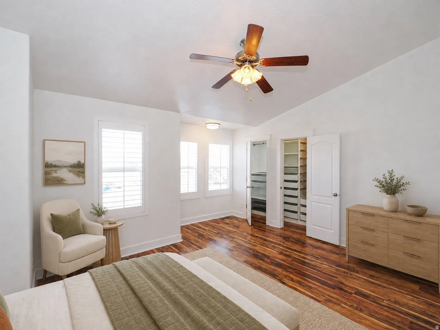 Vaulted ceiling with an overhead fan light fixture