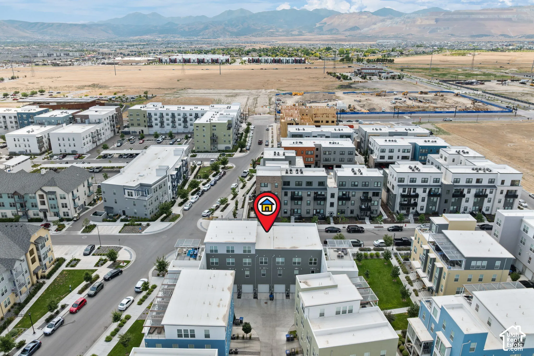Aerial perspective showcasing a contemporary urban development with various multi-story residences