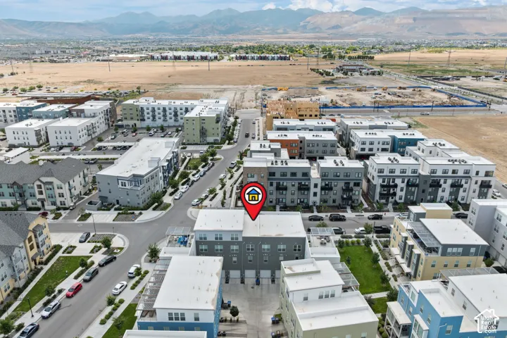 Aerial perspective showcasing a contemporary urban development with various multi-story residences