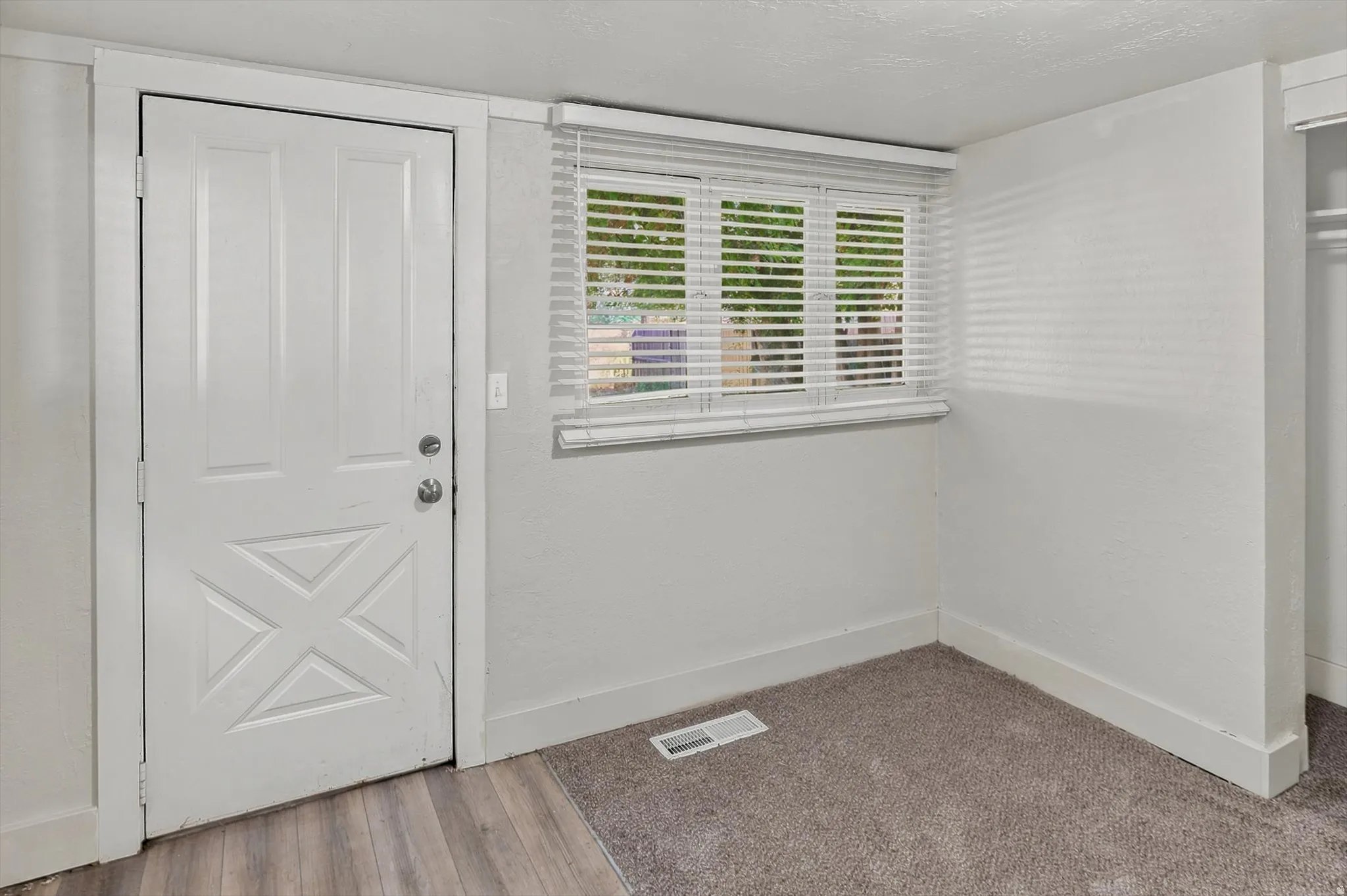 Bedroom two with back door