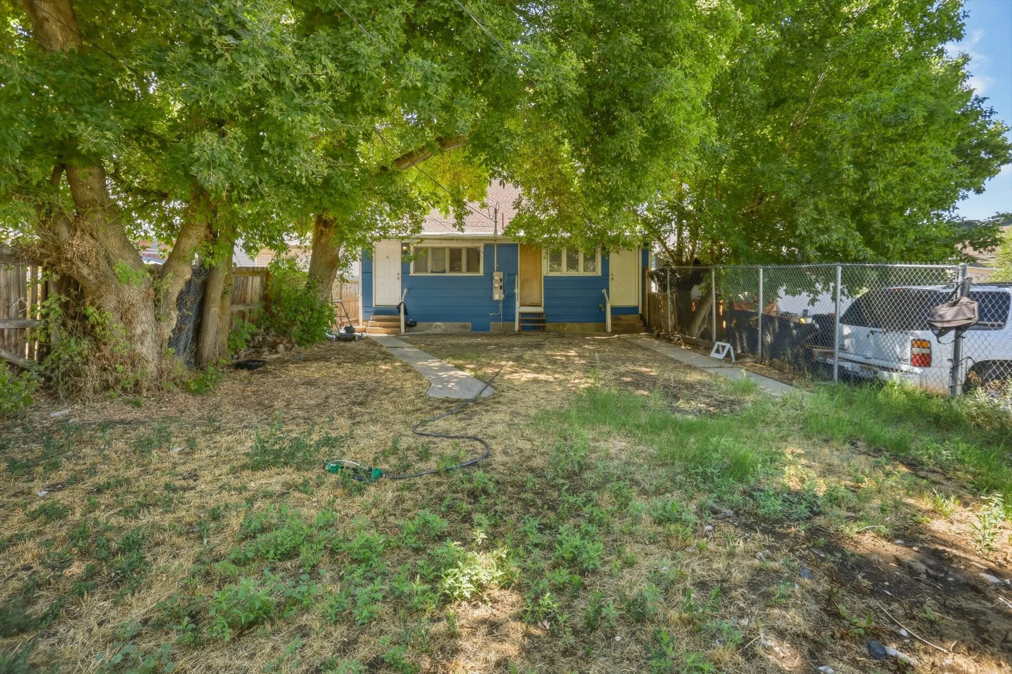 Shared fenced backyard