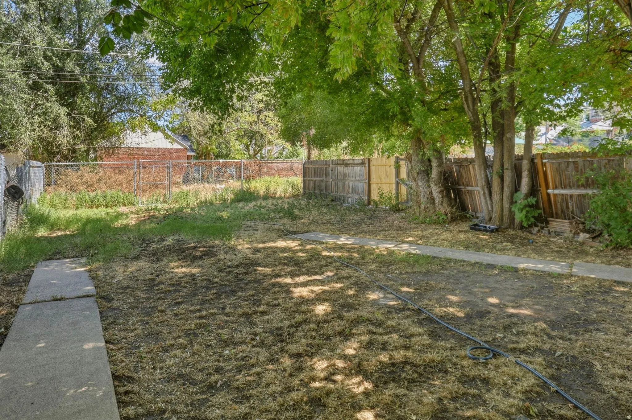 Shared fenced backyard