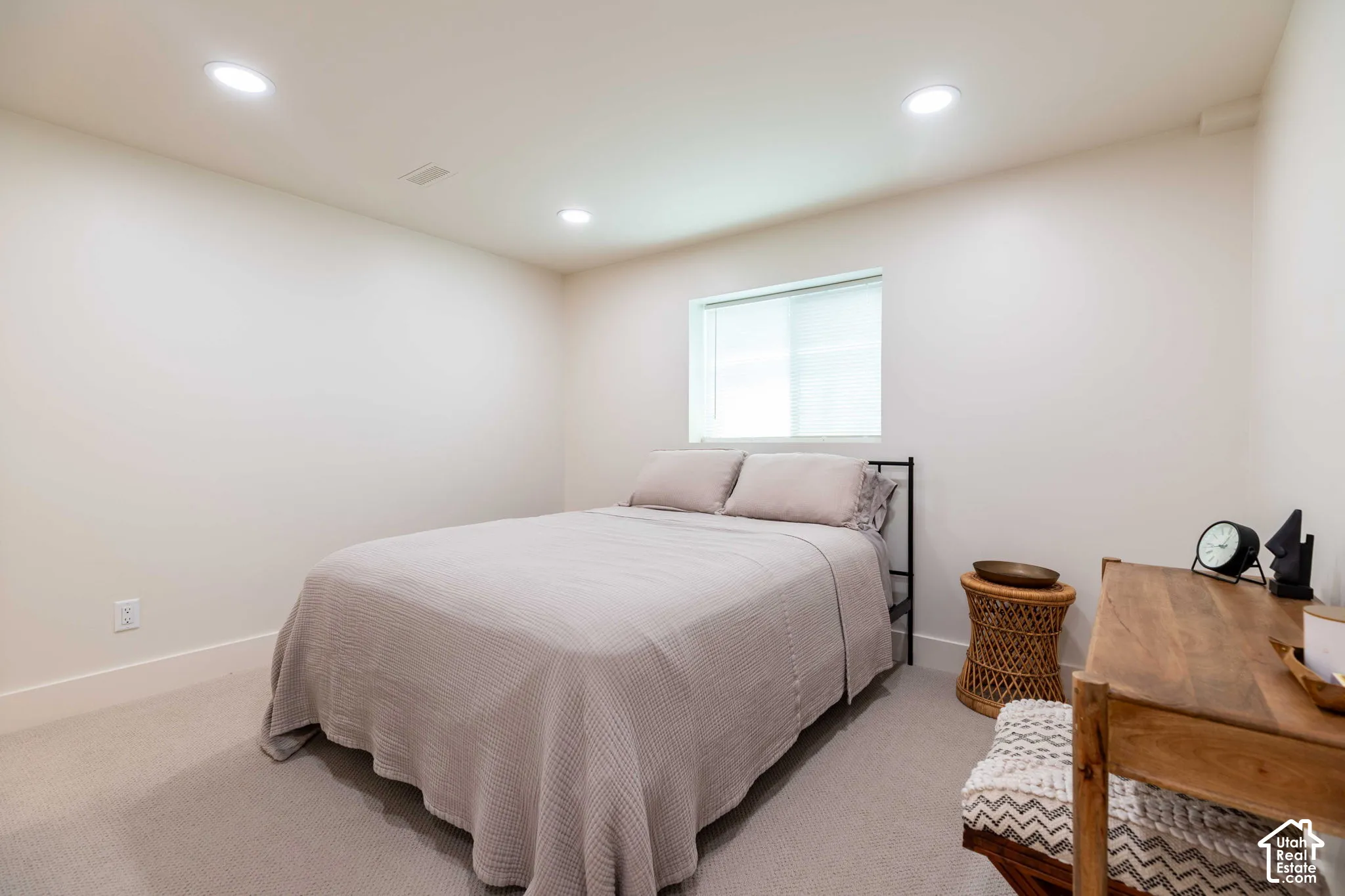 Bright interior space featuring recessed lighting and neutral wall tones