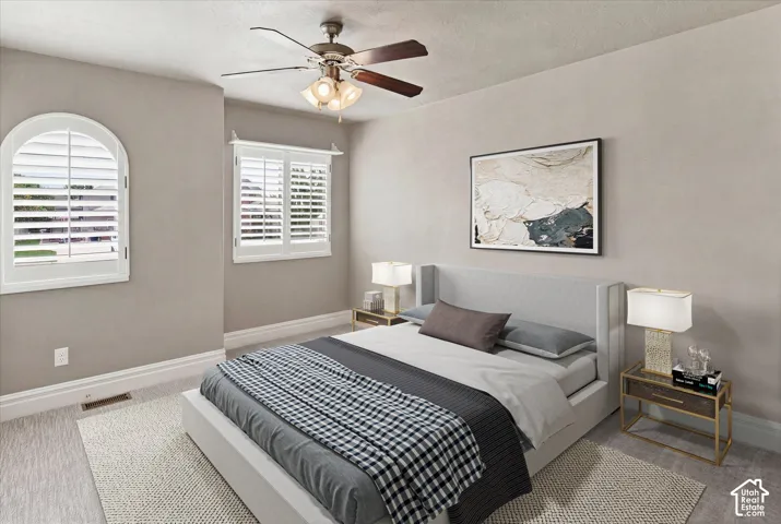 This Bedroom is currently being used as a dining room. The furniture in this picture has been photo shopped in.