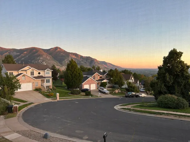 Neighborhood featuring mountain backdrop, cul-de-sac, mature trees, and residential architecture