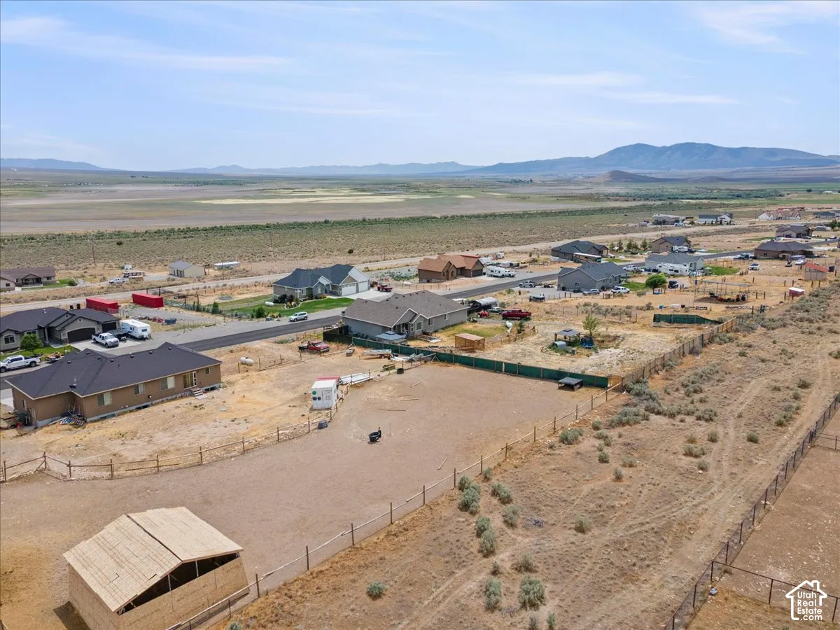 Expansive desert landscape with distant mountains
