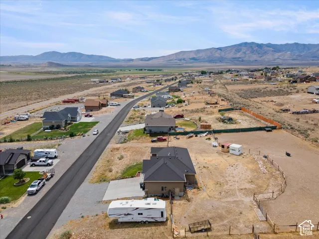 Expansive property featuring a flat, open landscape with distant mountains