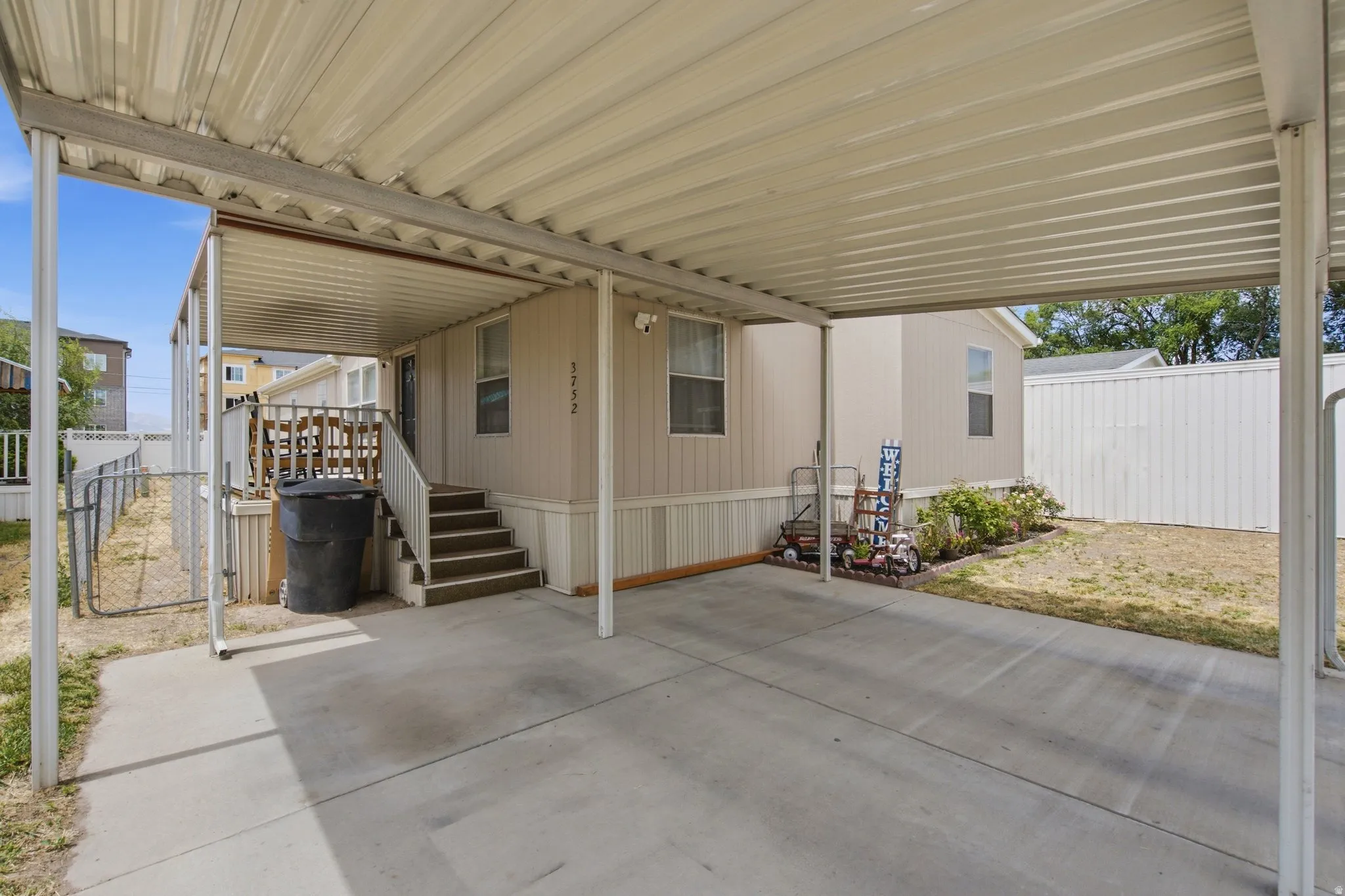 Covered carport providing sheltered parking