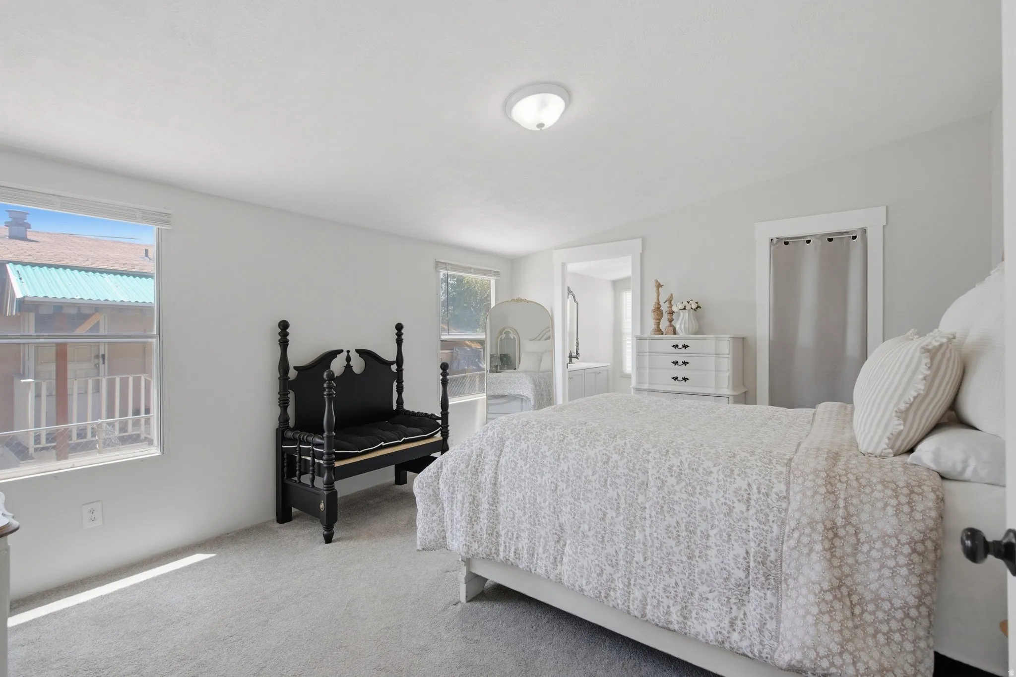 White walls with a ceiling-mounted light fixture