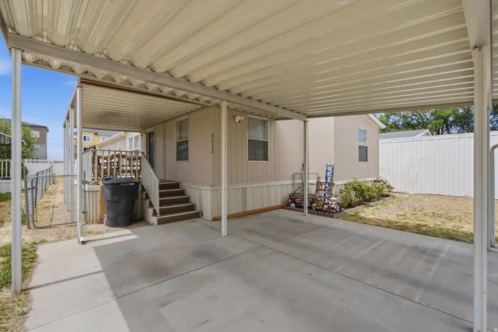 Covered carport providing sheltered parking