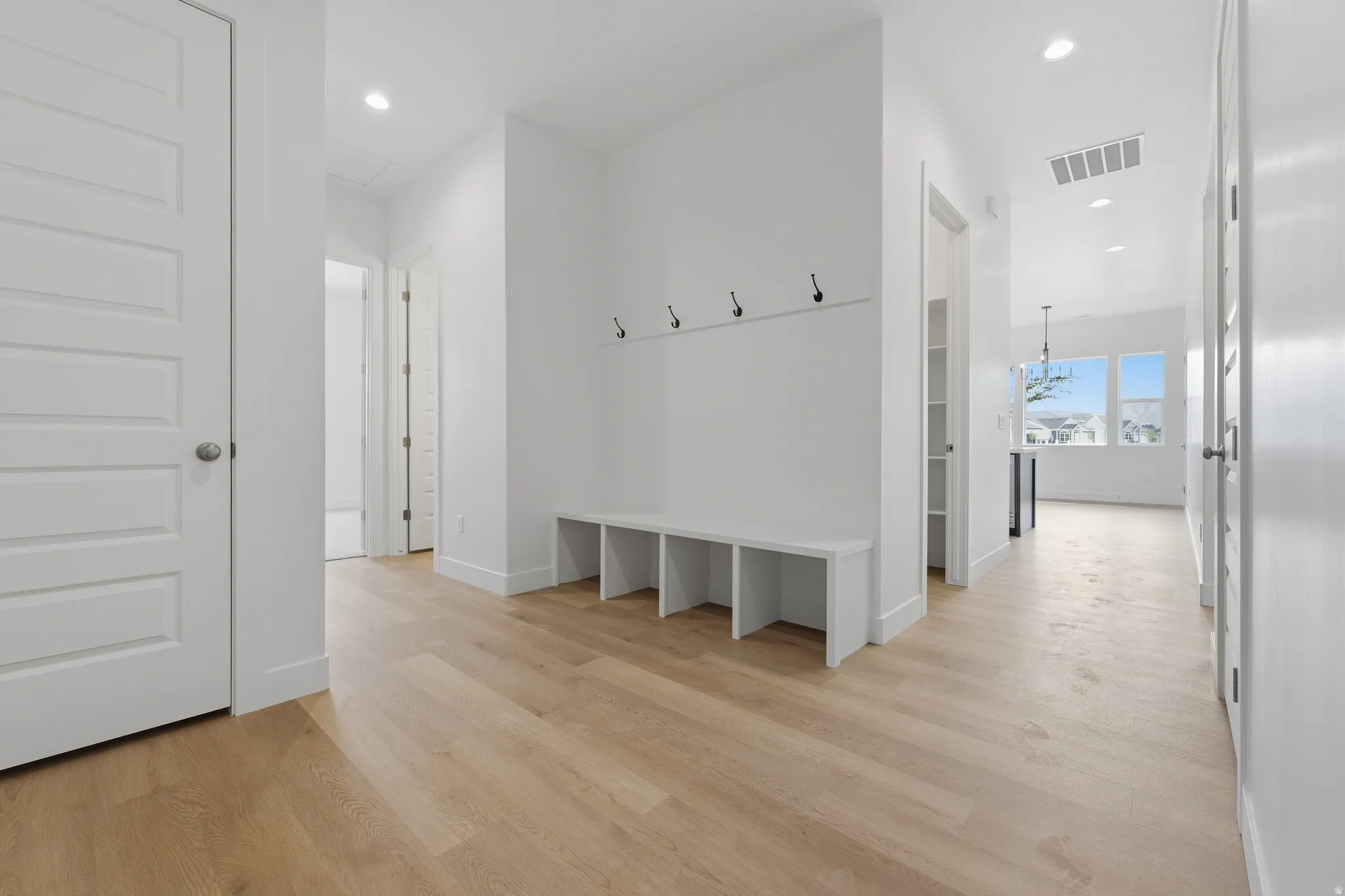 Open Concept Mudroom off garage entry