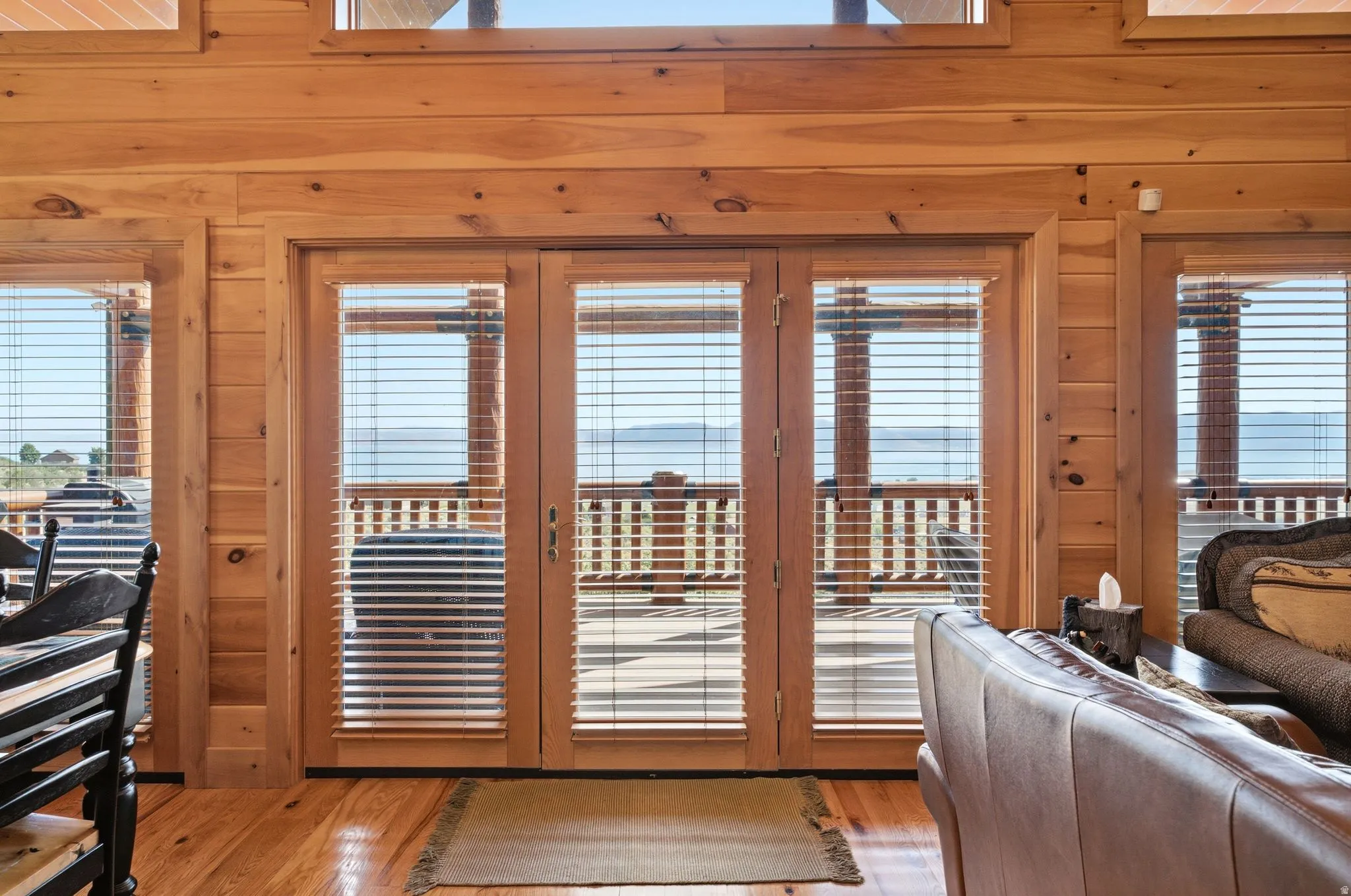 Expansive wood-finish flooring throughout