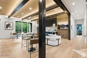Wide plank wood-finish flooring throughout