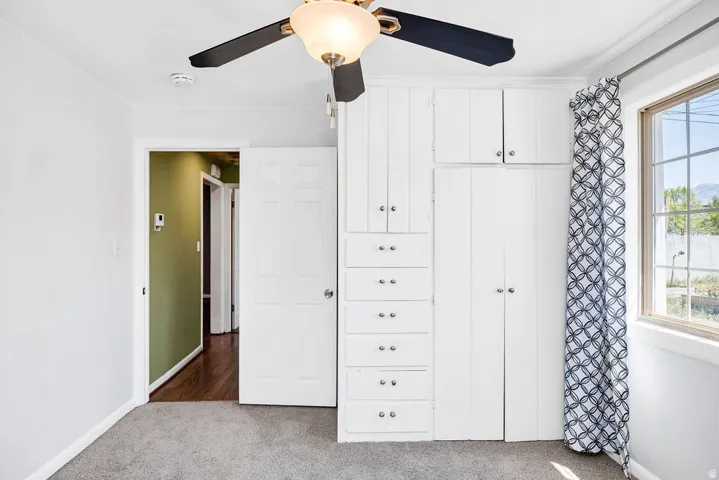Built-in cabinetry with integrated drawers and enclosed storage