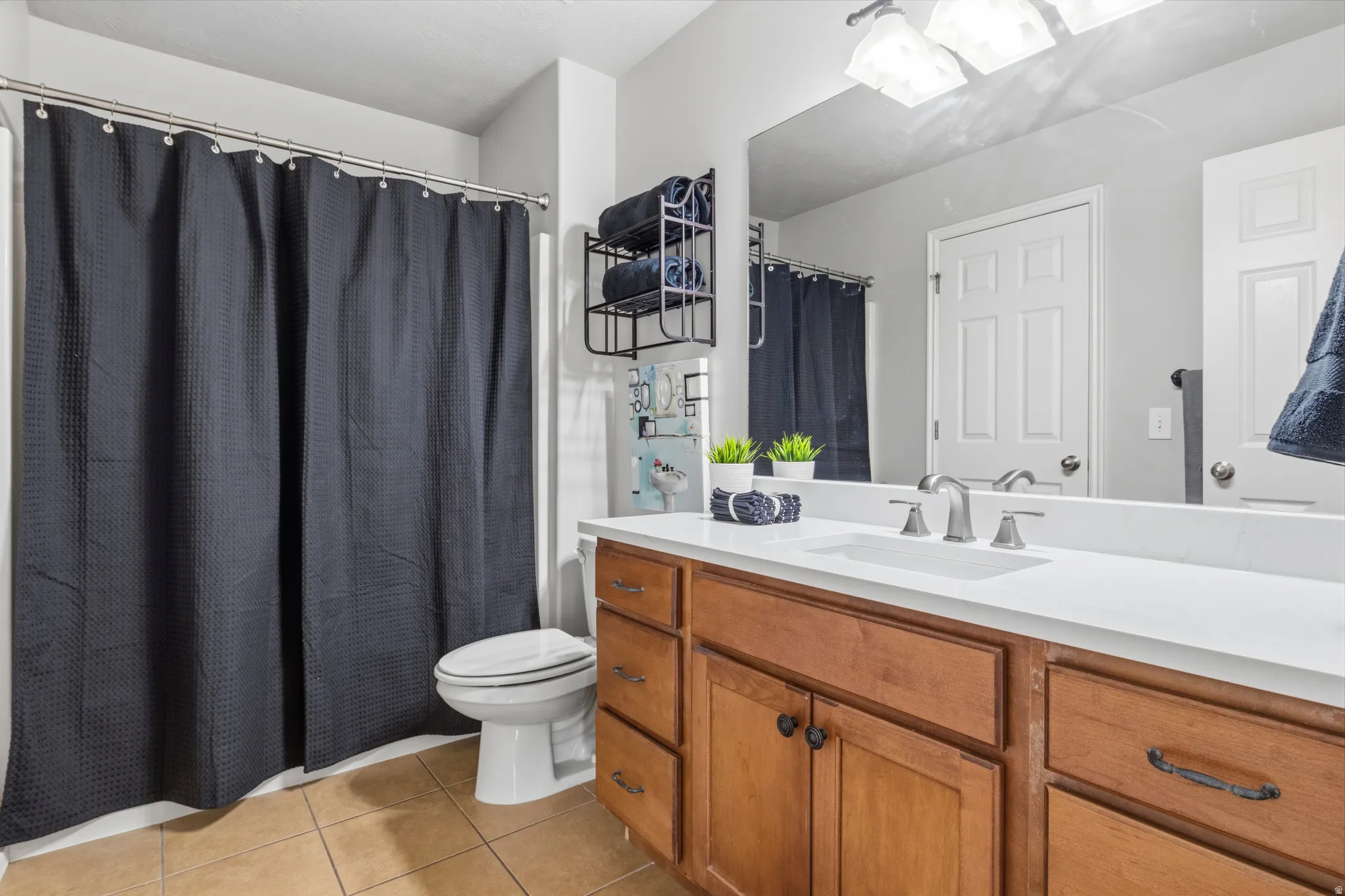 Full Bathroom: lengthy counterspace, brand new quartz