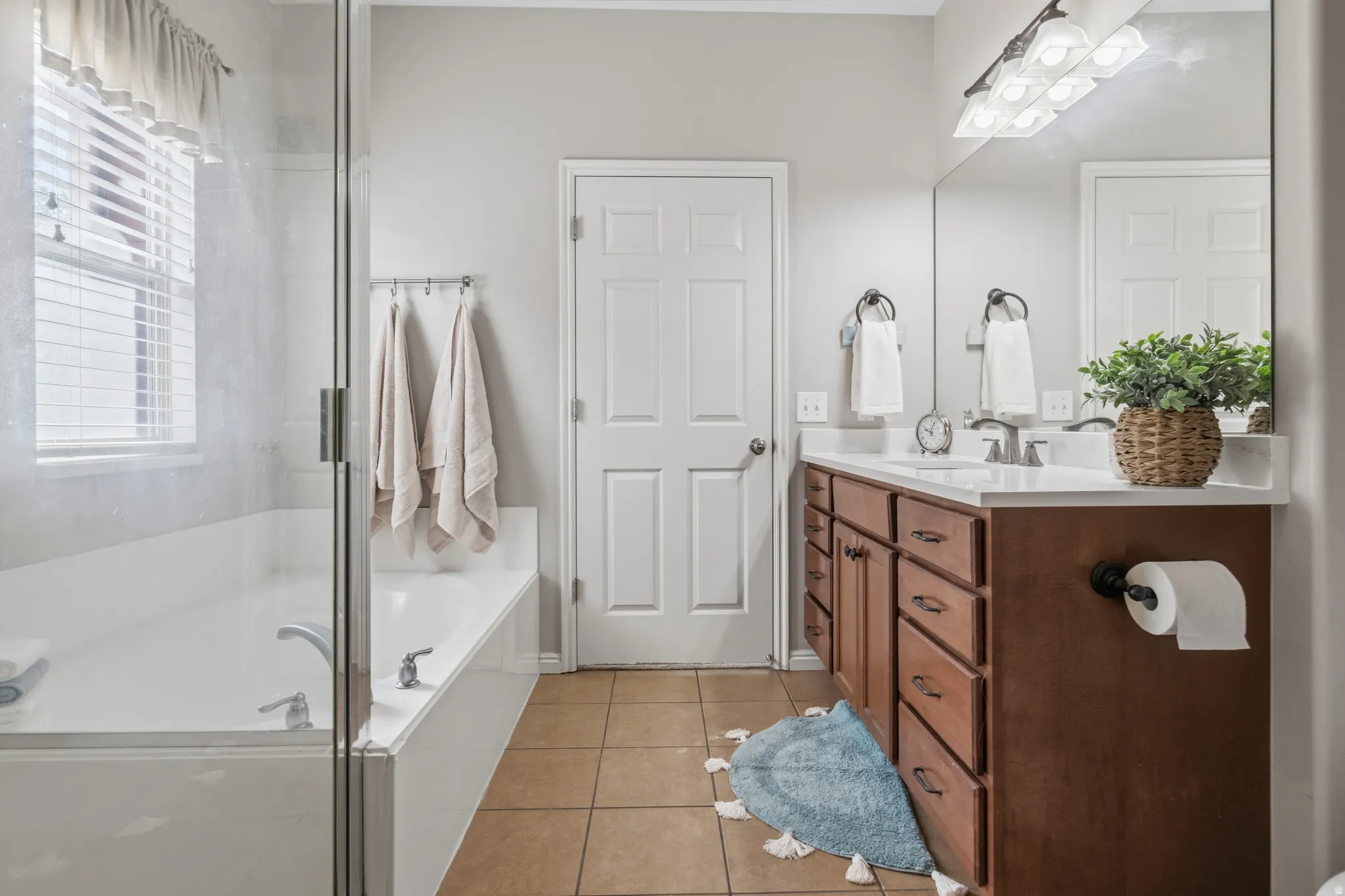 Primary Bathroom: separate tub & shower