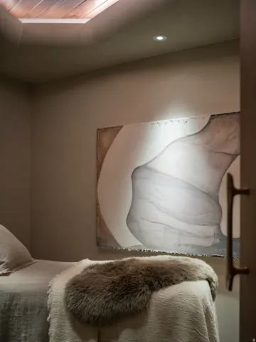 Room featuring a wood-finish ceiling inset, recessed lighting, and a neutral wall color