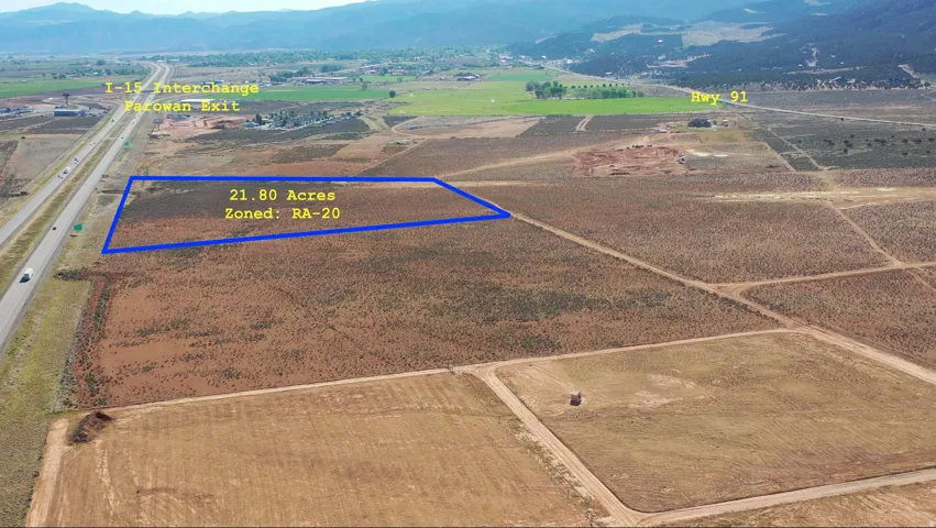 21.80 acres of undeveloped land zoned RA-20