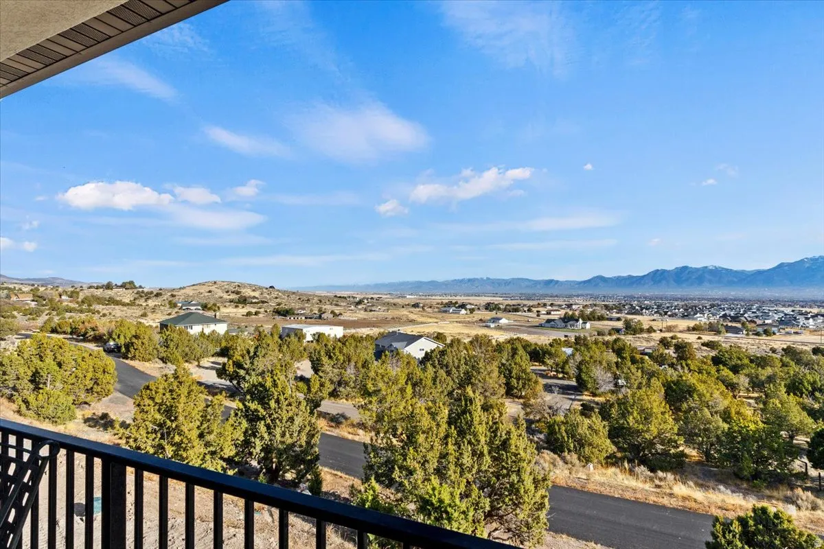 Expansive mountain and valley vistas from a private balcony