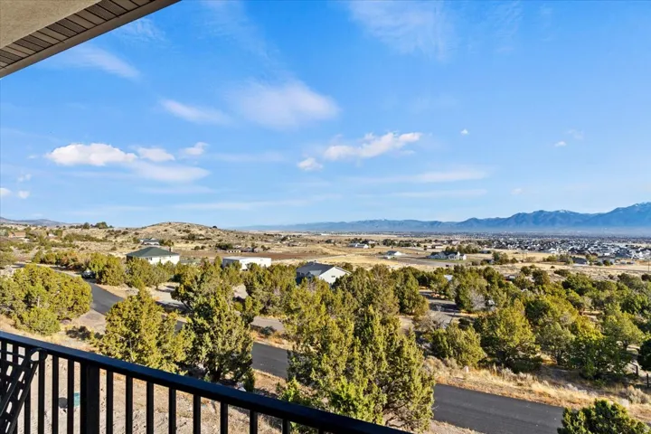 Expansive mountain and valley vistas from a private balcony