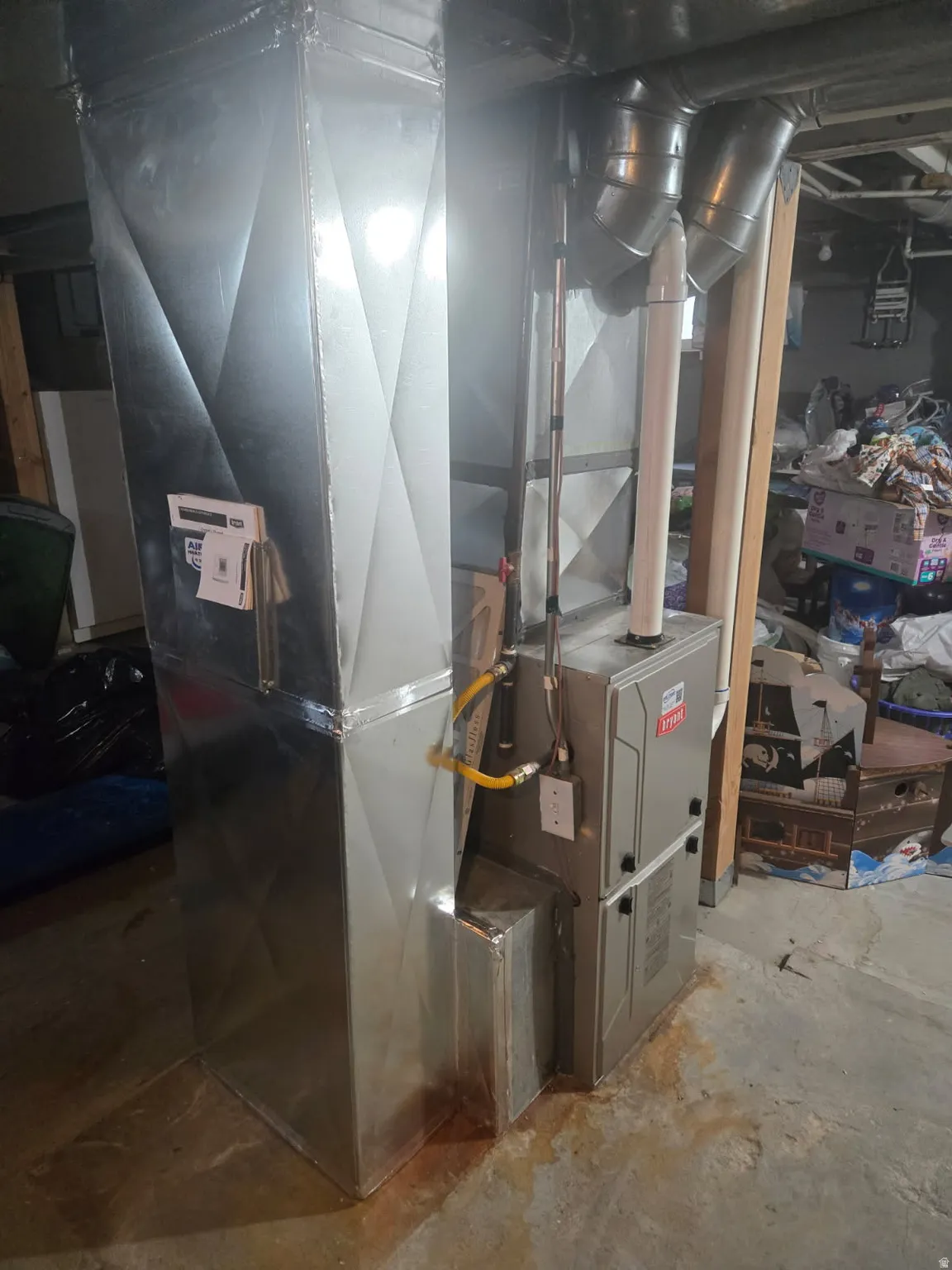 HVAC system with metal ductwork and visible gas line
