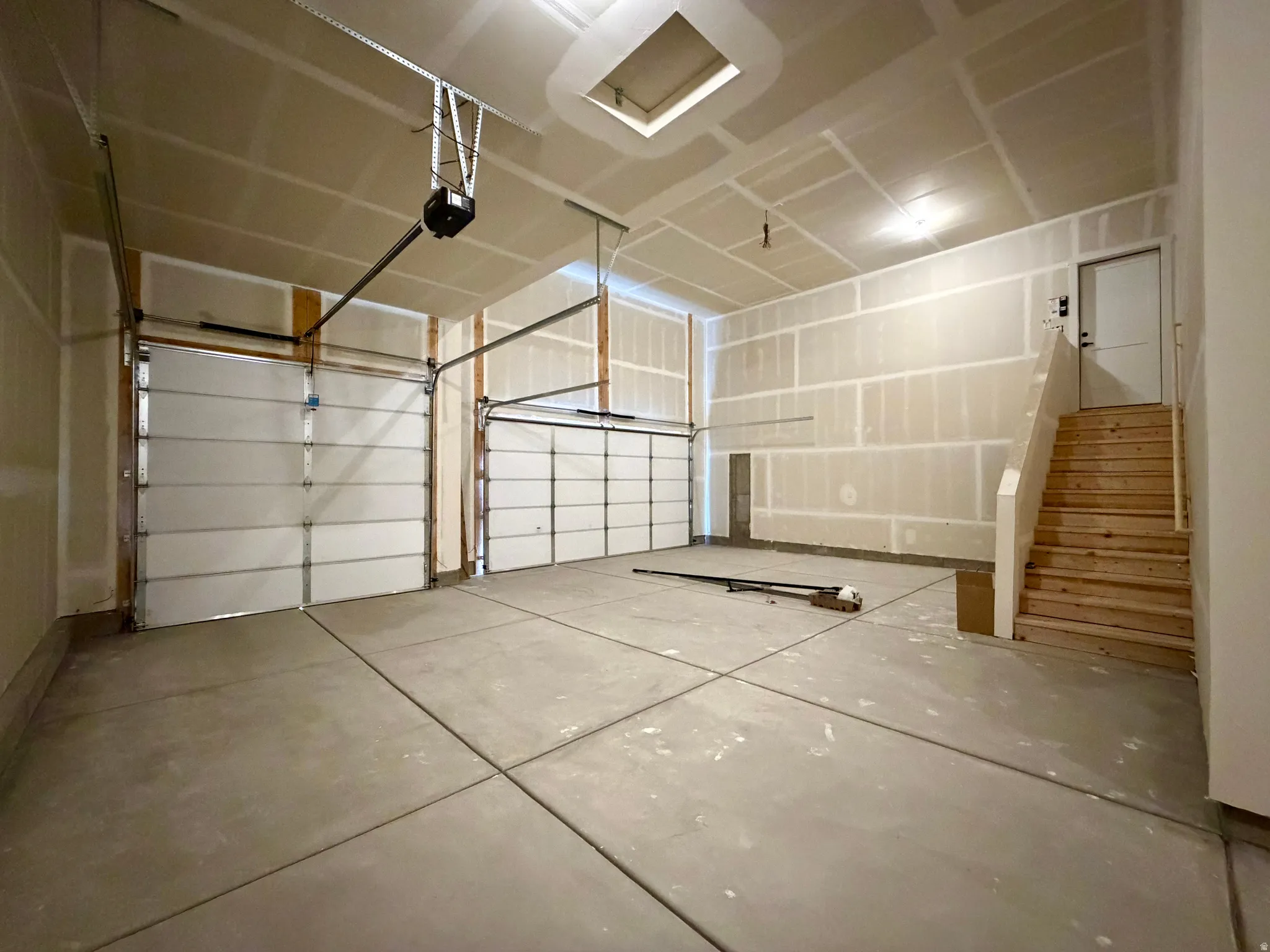 Spacious two-bay garage with concrete flooring