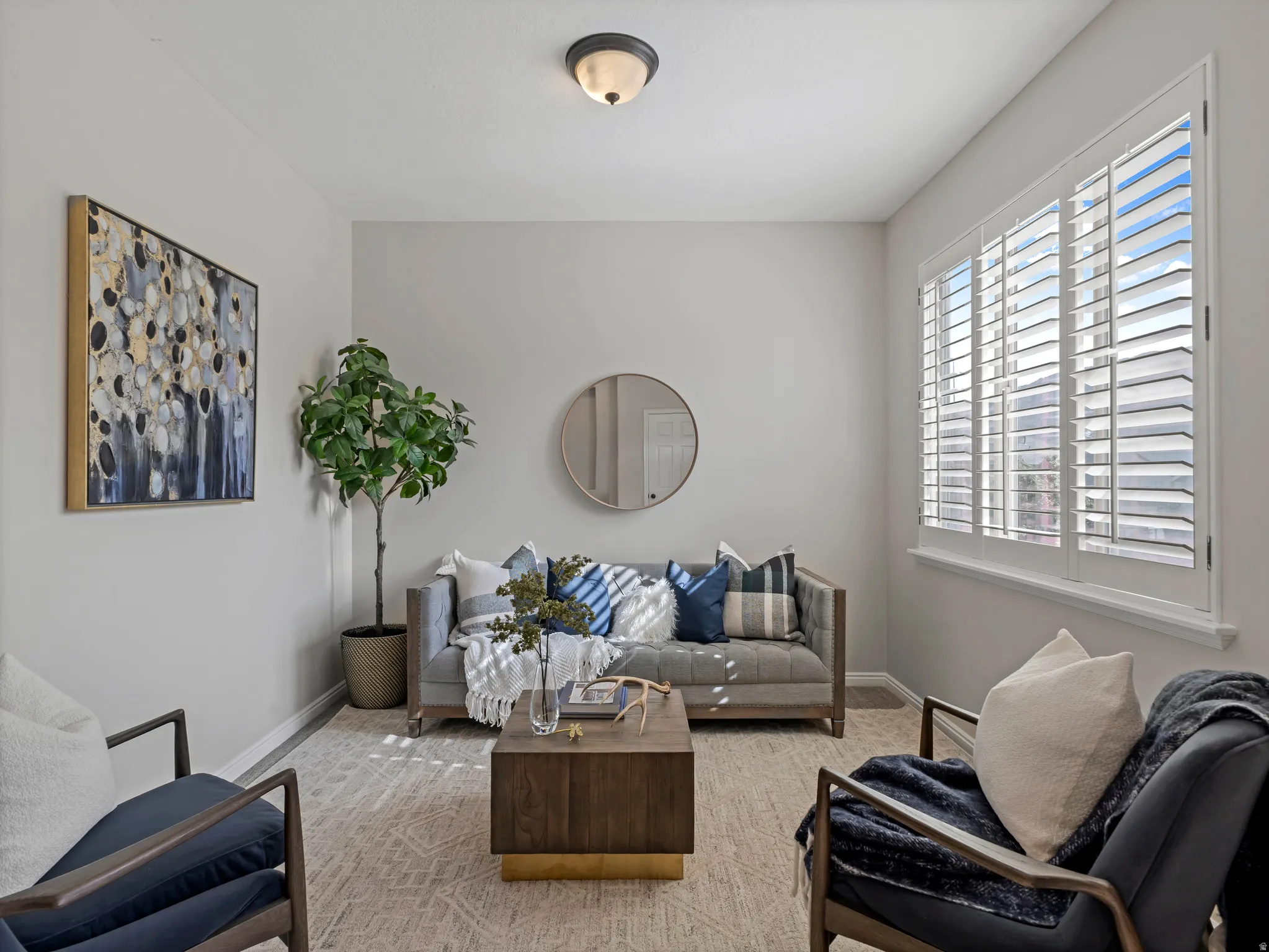 Interior room featuring light gray wall paint and a flush-mount ceiling light