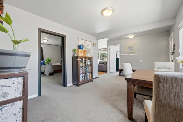 Neutral-toned interior with light gray walls and recessed lighting