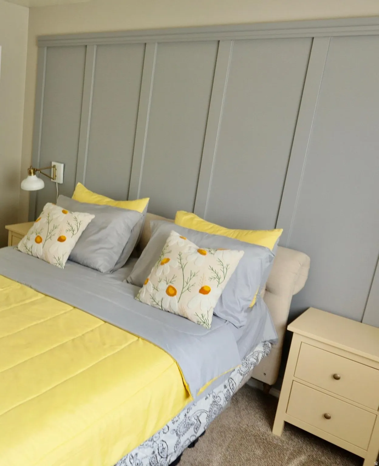 Board and batten wall accent with sconce lighting