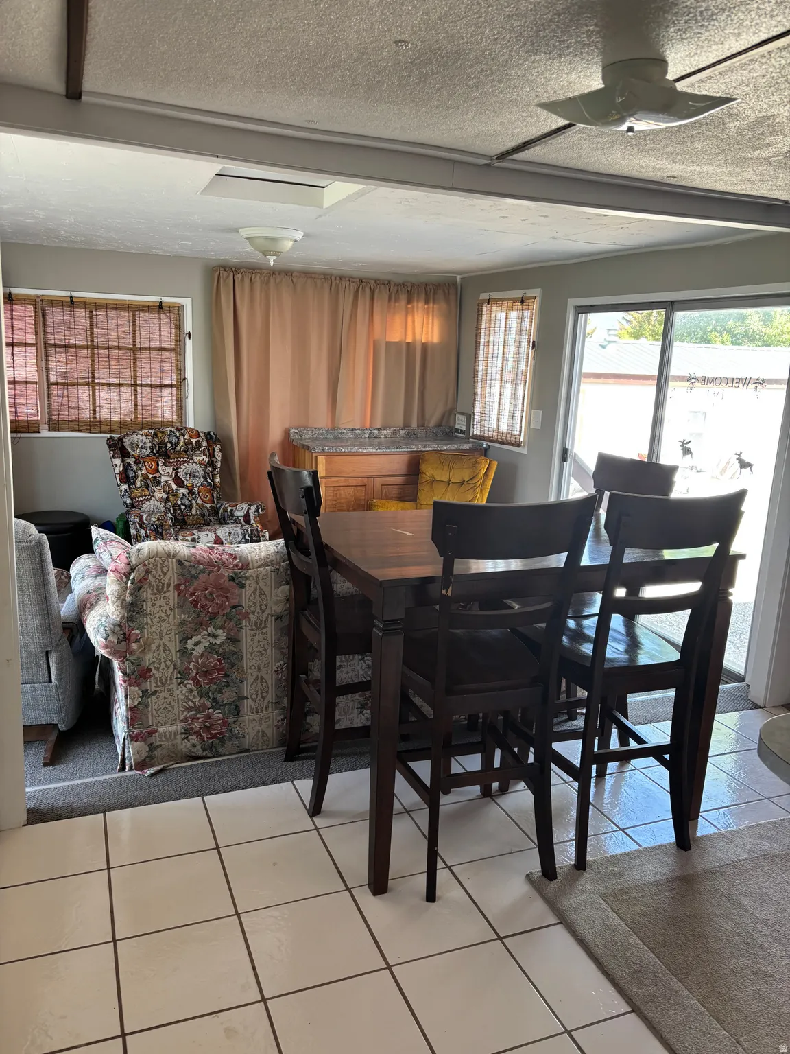 Ceramic tile flooring throughout the dining area
