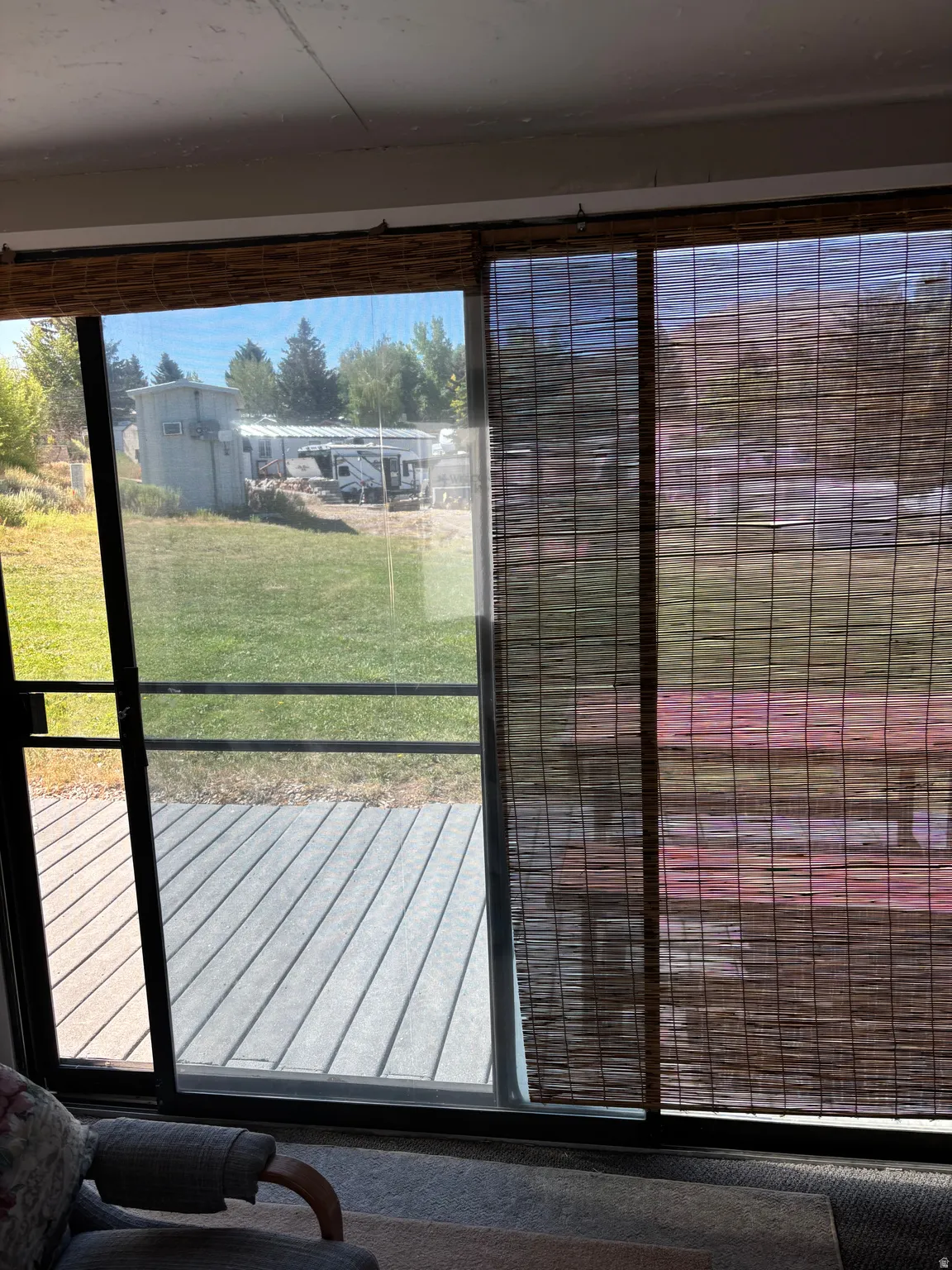 Sliding glass door opening to an outdoor composite deck