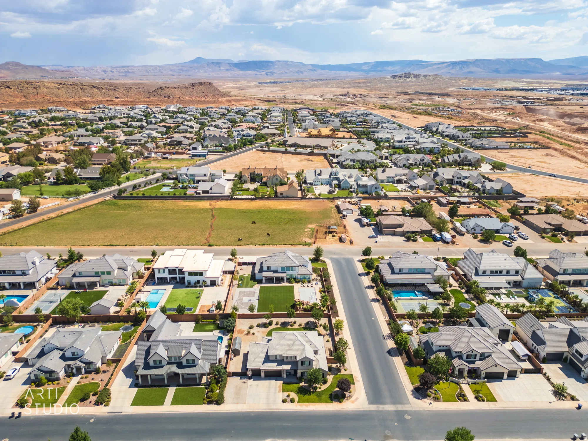 Aerial perspective of a residential neighborhood featuring varied architectural styles