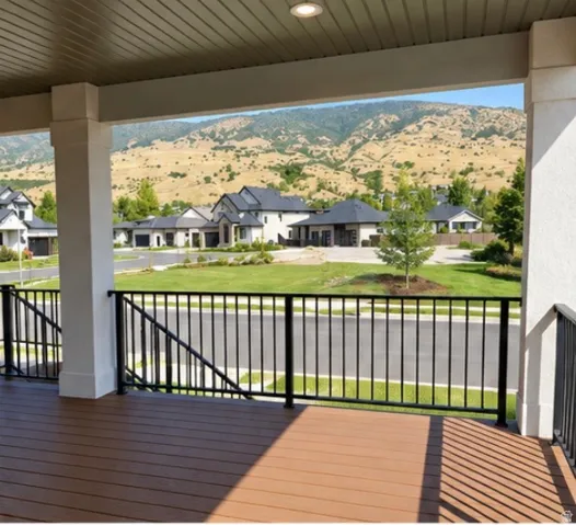 Expansive outdoor deck with wood-finish flooring, black metal railings, and recessed ceiling lighting