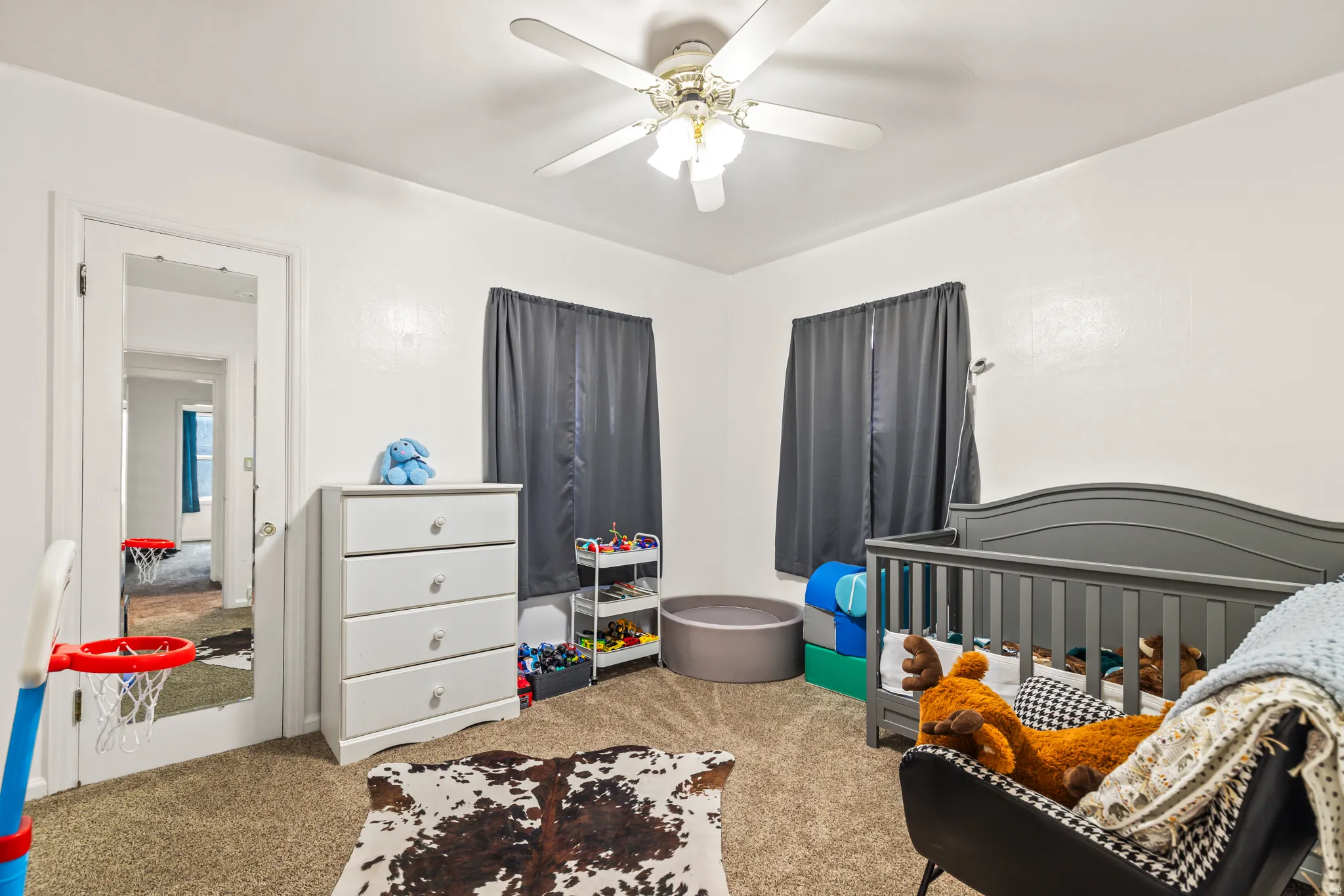 Neutral-toned wall paint and textured carpeting