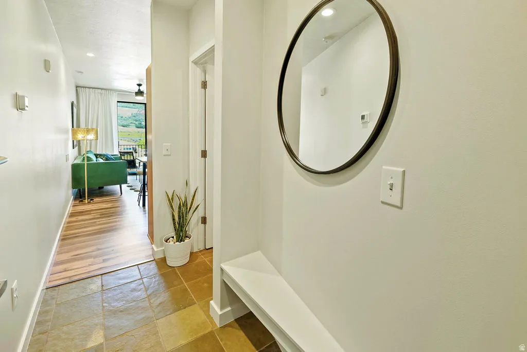 Condo entryway featuring slate flooring