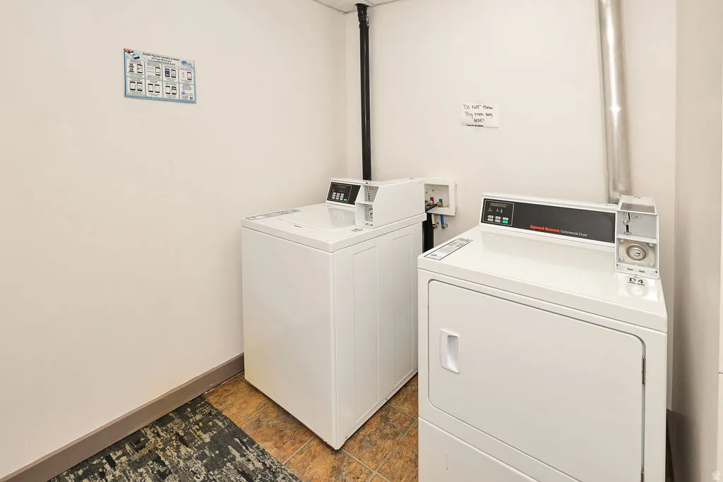 Laundry area directly across the hall from this condo