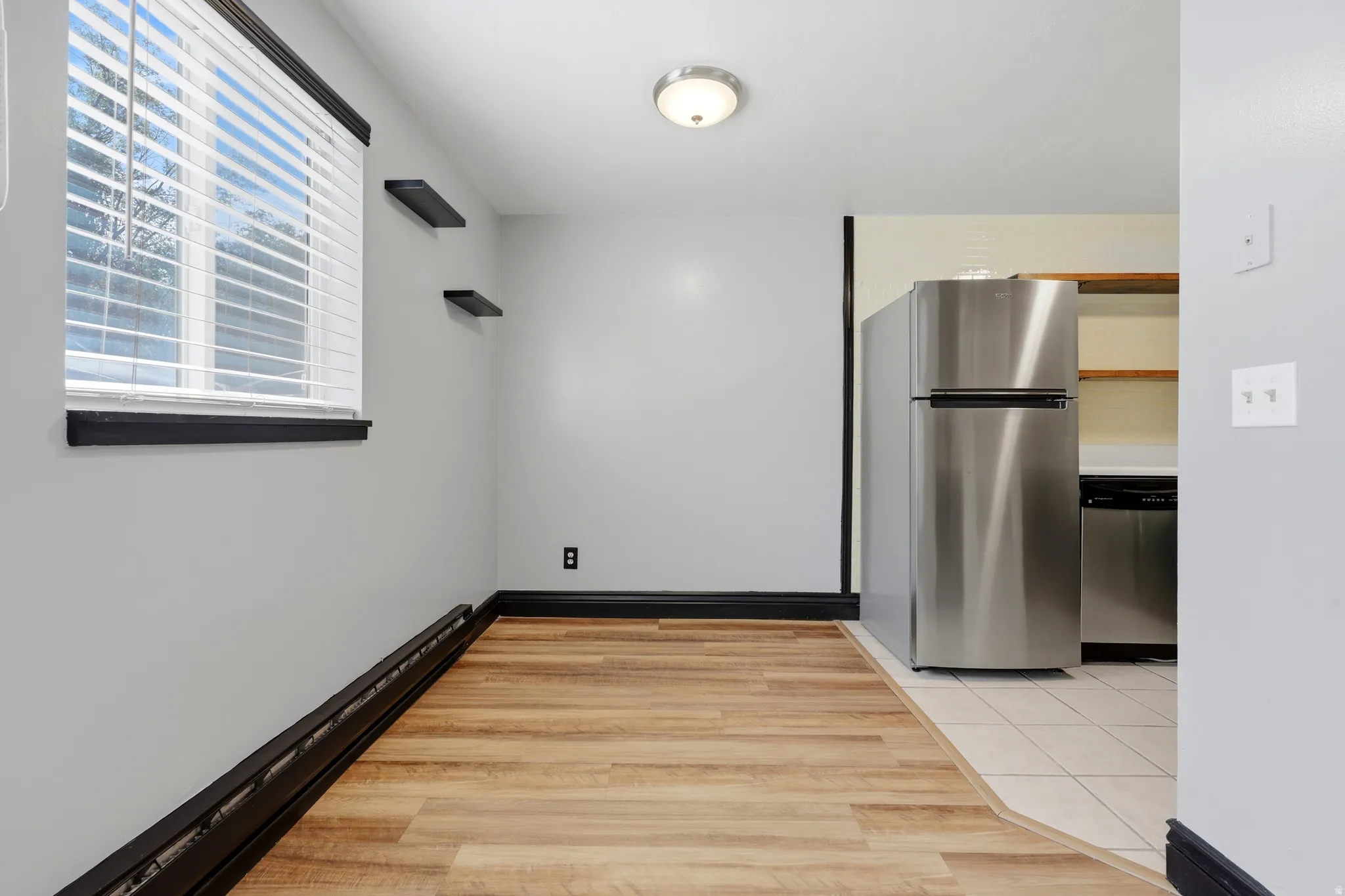 Contemporary interior with light gray walls and dark trim