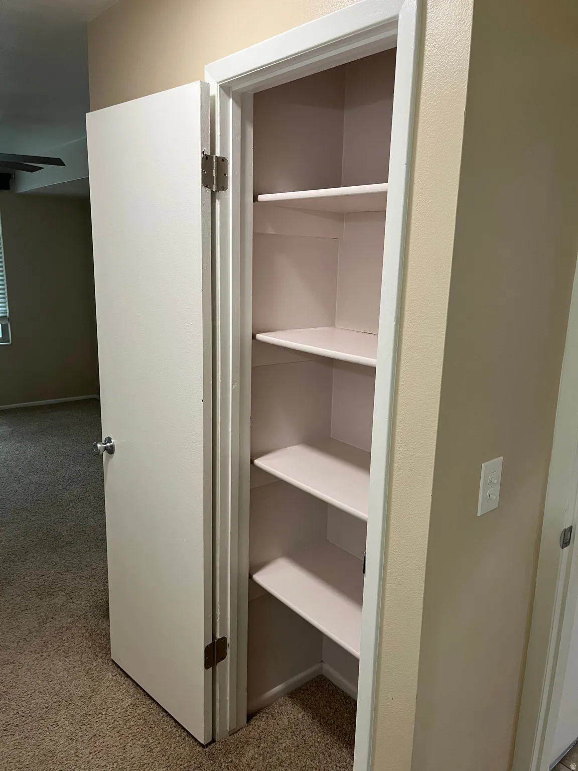Built-in shelving unit with multiple storage levels